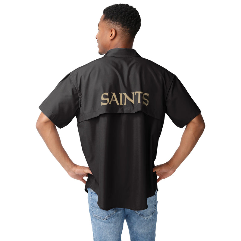 Antigua Men's New Orleans Saints Game Day Woven Fishing Shirt